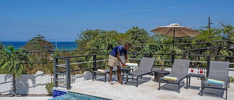 Pool deck with sun loungers