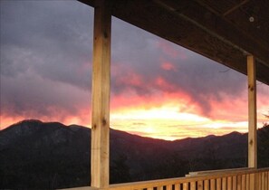 Watch the sunset while rocking on back porch