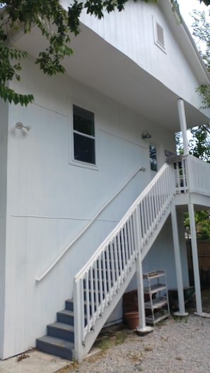 stairs up to landing and entry