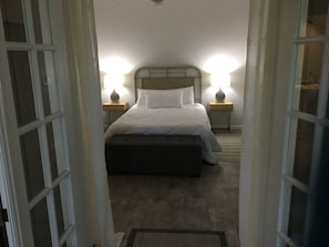 Bedroom with queen bed and in suite bathroom 