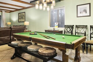 Full-size pool table inside the unit. 