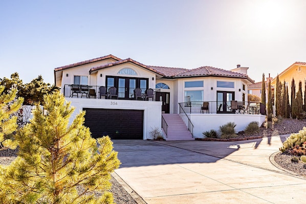 Front view of our home with large driveway.