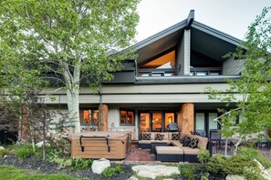 Patio with hot tub, seating, grill for relaxing outside