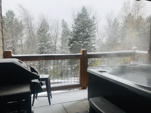 Watch the snow fall and take in the beautiful view from your private hot tub.