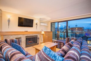Kick back your feet and relax in the spacious, bright living room.
