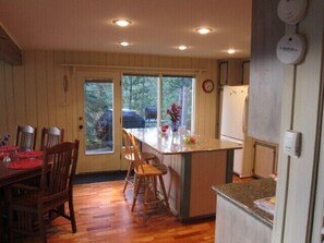 Kitchen table for eight and grills that are good to go with propane or charcoal