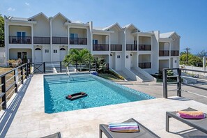 Pool deck and facade of townhouse