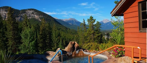 Soak in these incredible SHARED hot tubs overlooking the town of Banff and the Rockies