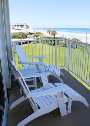 Relax in Adirondack Chairs on the Balcony 