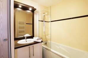 Get ready for your day on the beach in the bathroom.