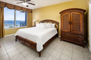 Master bedroom with king size bed and water views