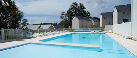You will love to spend time with family and friends at this outdoor pool, open in the summer.