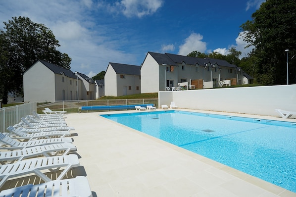 Dive into the outdoor pool during the summer.