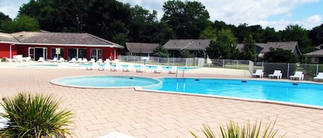 Dive into the gorgeous outdoor pool after a hot summer's day.