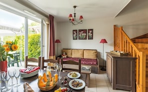 Experience the stylish living area as you have a nice dinner with family and friends.