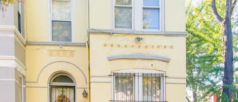 Front facade of our beautiful end unit row house with tons of natural light.