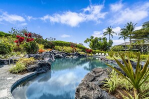 Gated, heated pool is just a short walk from villa.
