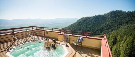Soak in the Shared Hot Tub overlooking the area.
