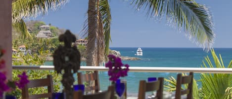 Dining area overlooking the beach and ocean