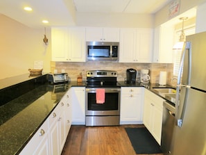 NEW kitchen with Stainless Steel Appliances.