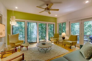 Whimsical accents – Egg Chair, groovy lamps, hip coffee table & shag rug!  