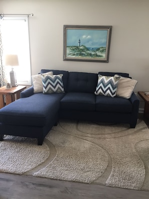 Living room with Queen Serta sleeper sofa