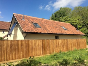 The back of the stable from the footpath.