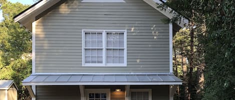 Front of the 5 Points Carriage House with off-street parking just in front.