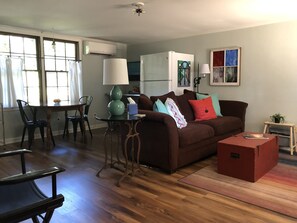 Open the front door to find an open living space on the main floor. 