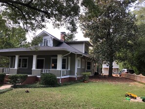 Main house on Milledge Circle with Carriage House at the end of the driveway.
