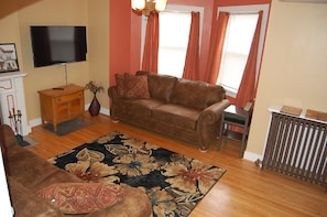 Spacious Living Room.  Two full couches.  Large screen TV
