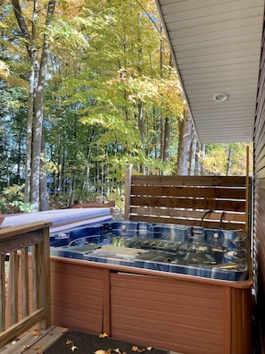 8 person Hot Tub on Deck just through back door.