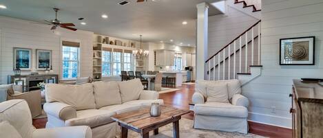 Living room, dining room, seating area and kitchen