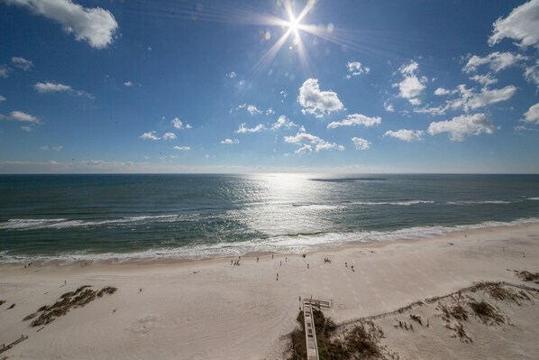 White sandy beach and crashing waves are your direct view.