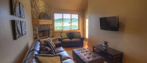 Main Living space with Leather sofas, Flatscreen and Fireplace