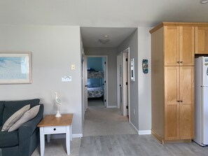 Hallway from main living space to second and third bedrooms