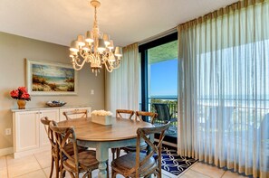 Dining room with patio view of the ocean