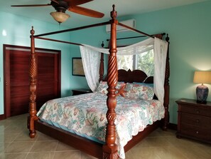 King-sized, hand carved teak, four poster, canopy bed