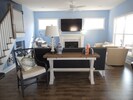 View from Kitchen Area to Living Room - Sofa Table Doubles as Buffet