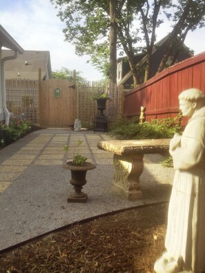 Enter the Cottage Through a Private Courtyard Garden