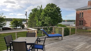 Beautiful deck overlooking lawn and Sheepscot River.
