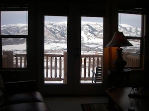 Enjoy a warm fire with magnificent panoramic views of the skiing slopes!