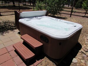 Relax in clean four person hot tub