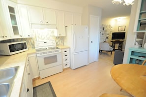 Kitchen with Microwave, Fridge, Pantry and Dishwasher