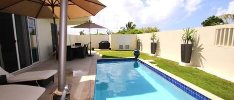 Private inner courtyard with heated pool , weber grill. This is living!