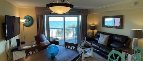 Beautiful Ocean Front Living Room, leather recliners, kitchen table, Granite Bar