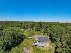 Ariel view of property and behind