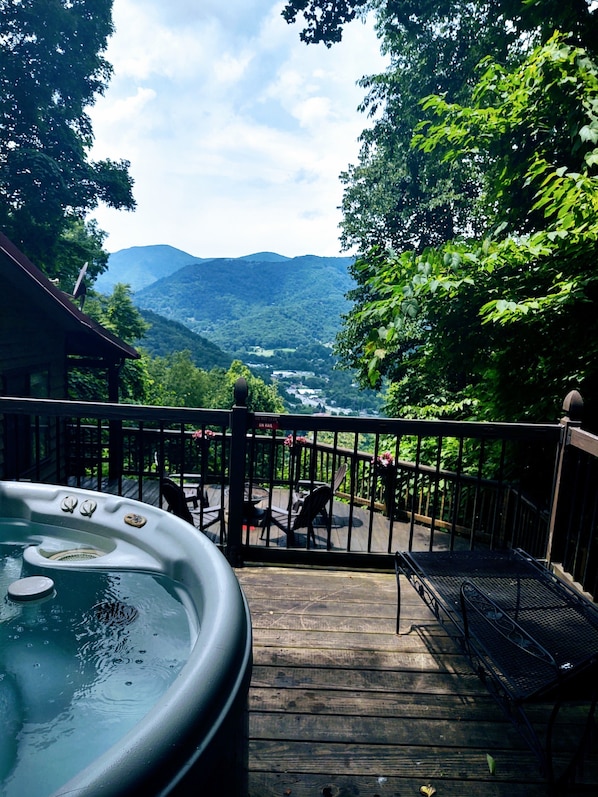 Upper hot tub deck overlooking Maggie Valley with total privacy .