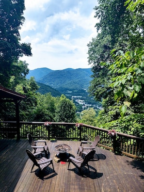 Lower deck with fire pit overlooking beautiful Maggie Valley.