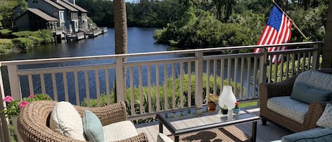 Spacious deck, comfortable stylish seating, and a great view!